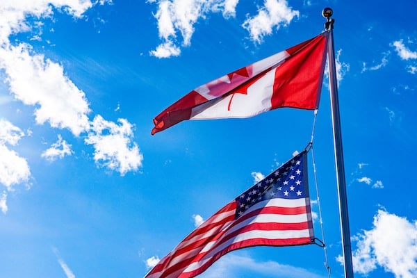 US and Canadian flags